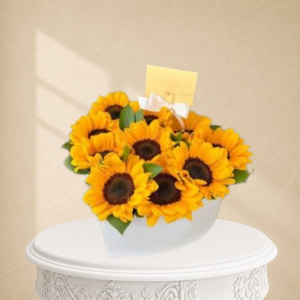 box de girasoles en caja blanca